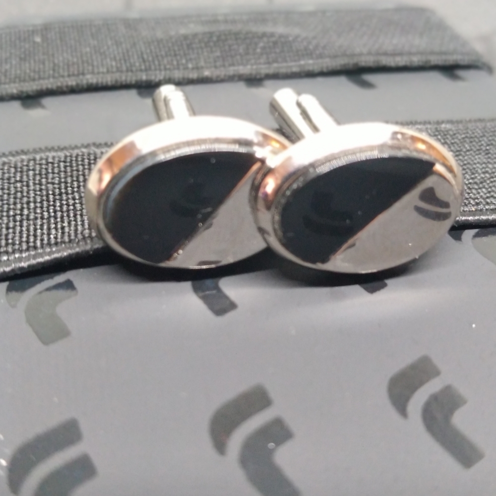 Silver and black cuff links